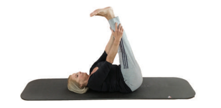 woman doing excercise using mat