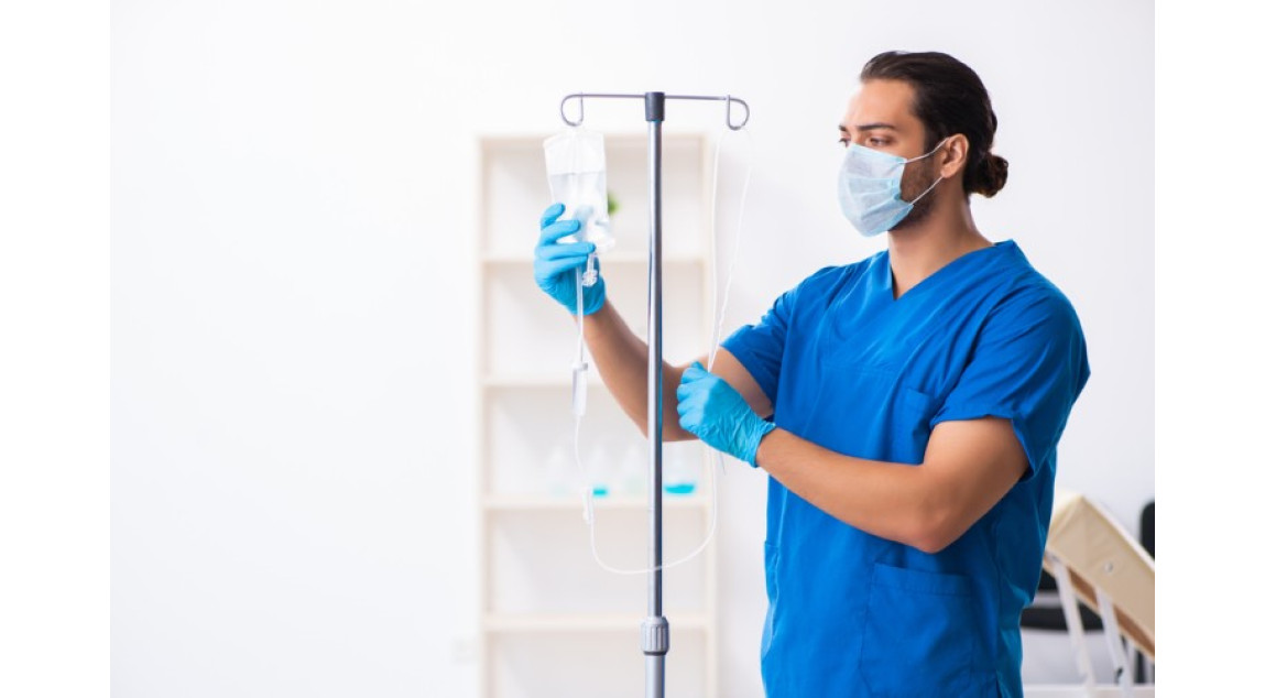 Doctor using IV Drip pole